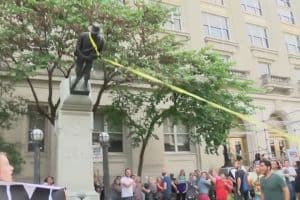 Protestors topple confederate statues