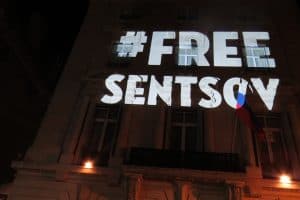 projection of #FreeSentsov on a building