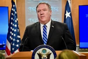 secretary of state mike pompeo stands behind lectern