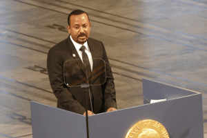 ethiopia's prime minister speaking at a podium