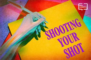 Hand holding a pen over a yellow piece of paper. The piece of paper reads, in purple, “Shooting Your Shot”
