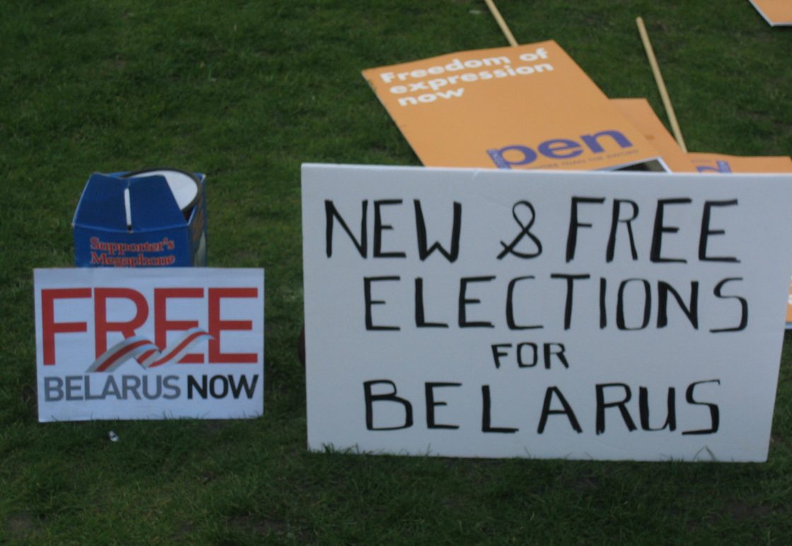protest sign reading "new and free elections for Belarus"