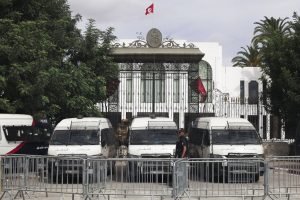 Police cars block the entrance of the Tunisian parliament