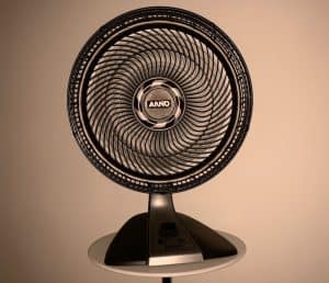 grey fan on a small table