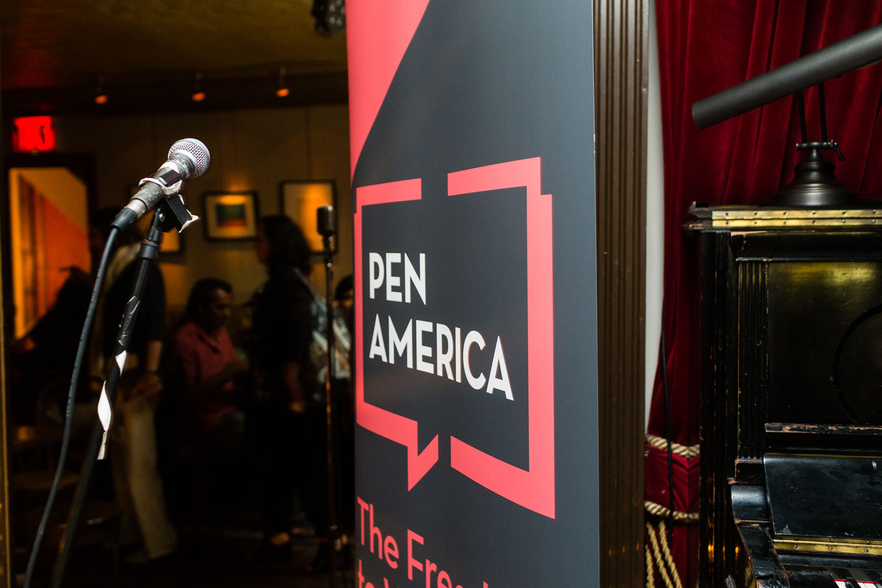 pen america banner and microphone