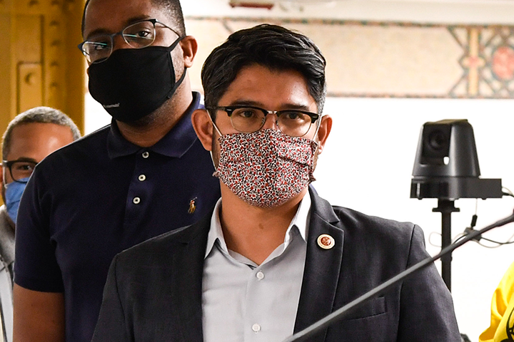 Carlos Menchaca, masked, at the 59th Street Station in New York City