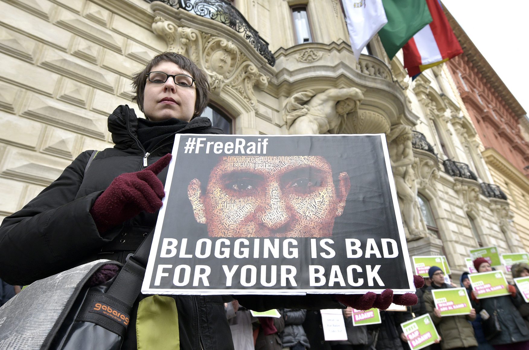 Members of the Austrian Greens attend a protest in 2015 against the detainment of Saudi blogger Raif Badawi