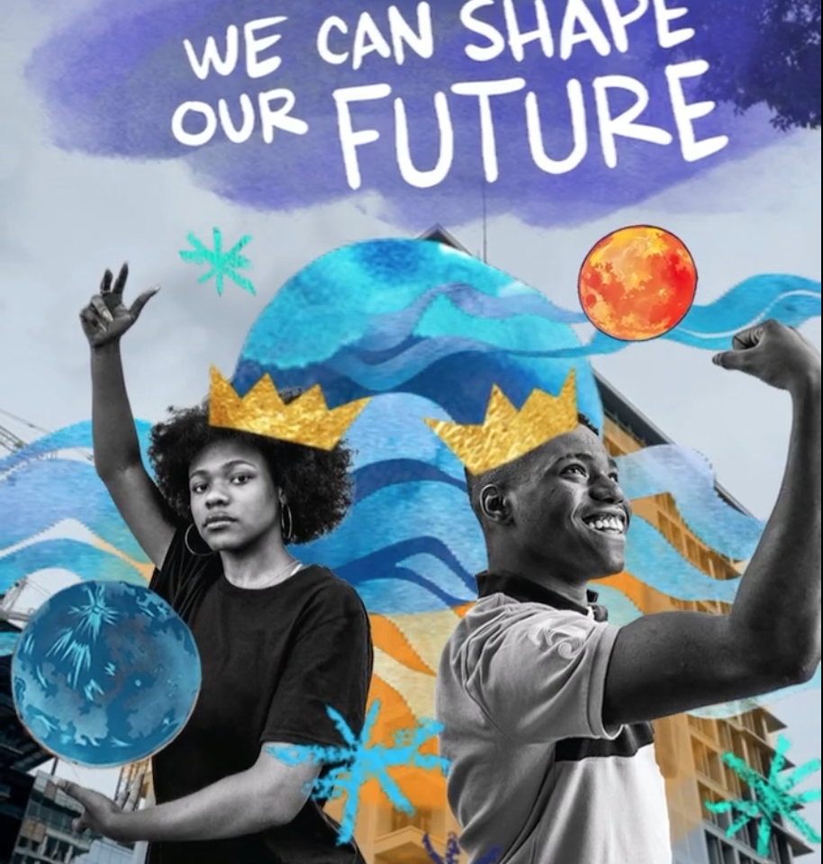 Two people pose on the side of a building wearing crowns and holding planets, above them is text that reads, "We Can Shape Our Future"