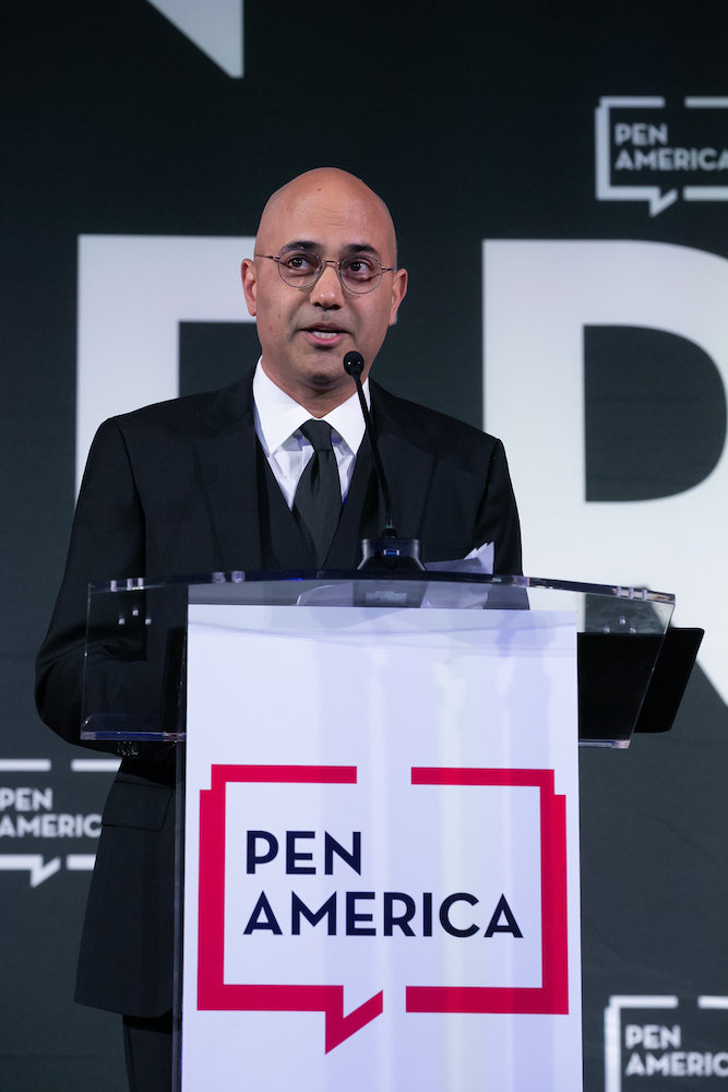 Ayad Akhtar speaking at the lectern at the 2021 PEN America Literary Gala