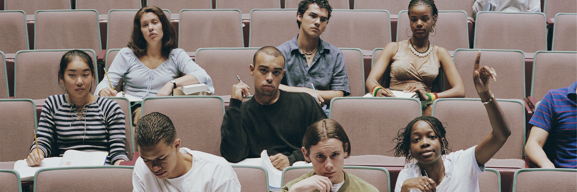 High school students sitting in a school auditorium
