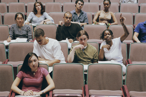 High school students sitting in a school auditorium
