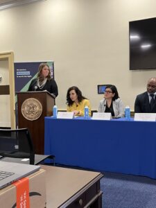 Nadine Farid Johnson (center) speaks at a panel discussion on educational censorship in K-12 schools.