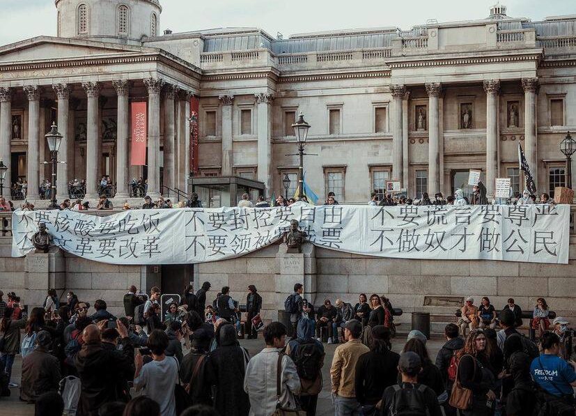 Protestors in London hung banners outside the National Gallery in Trafalgar Square