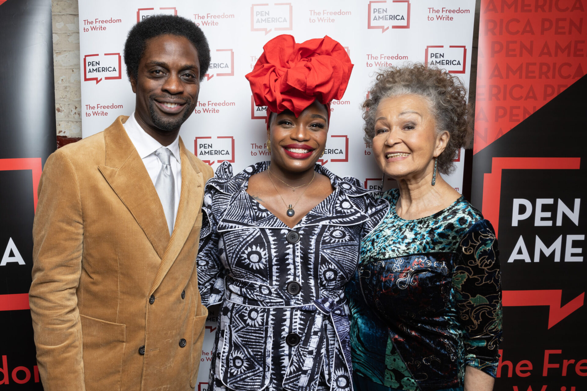 Adesola Osakalumi, Erika Dickerson-Despenza, and Lizan Mitchell backstage at the 2023 PEN America Literary Awards.