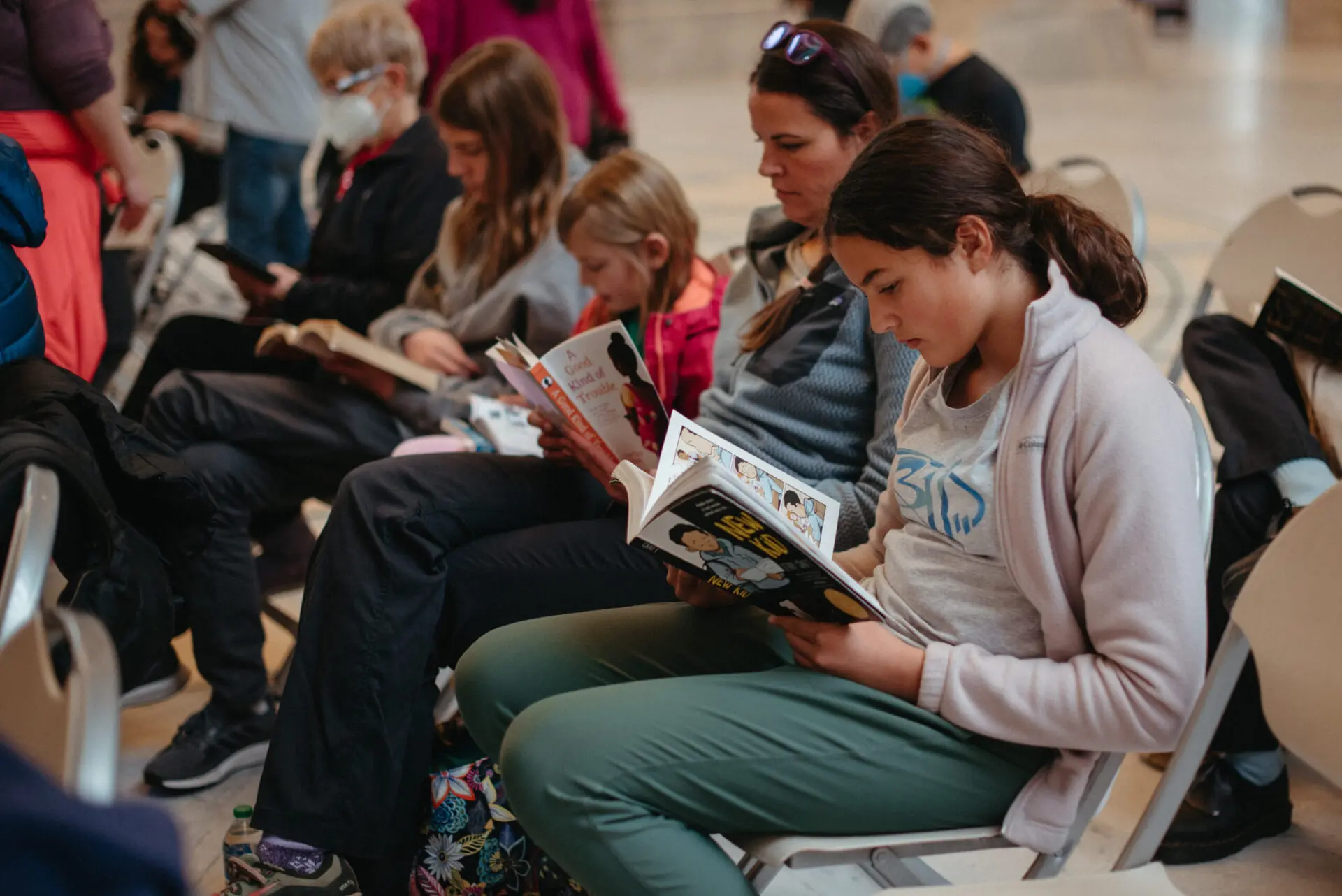 Kids read from banned books at the Let Utah Read event.