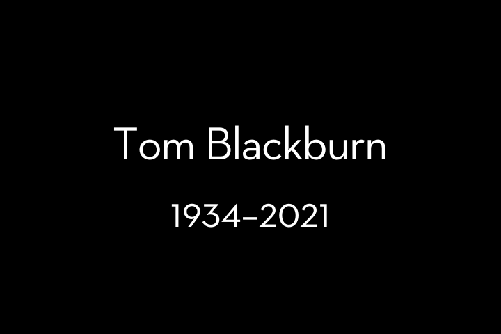 White text on a black background reads Tom Blackburn 1934–2021, indicating the name and lifespan of a person.
